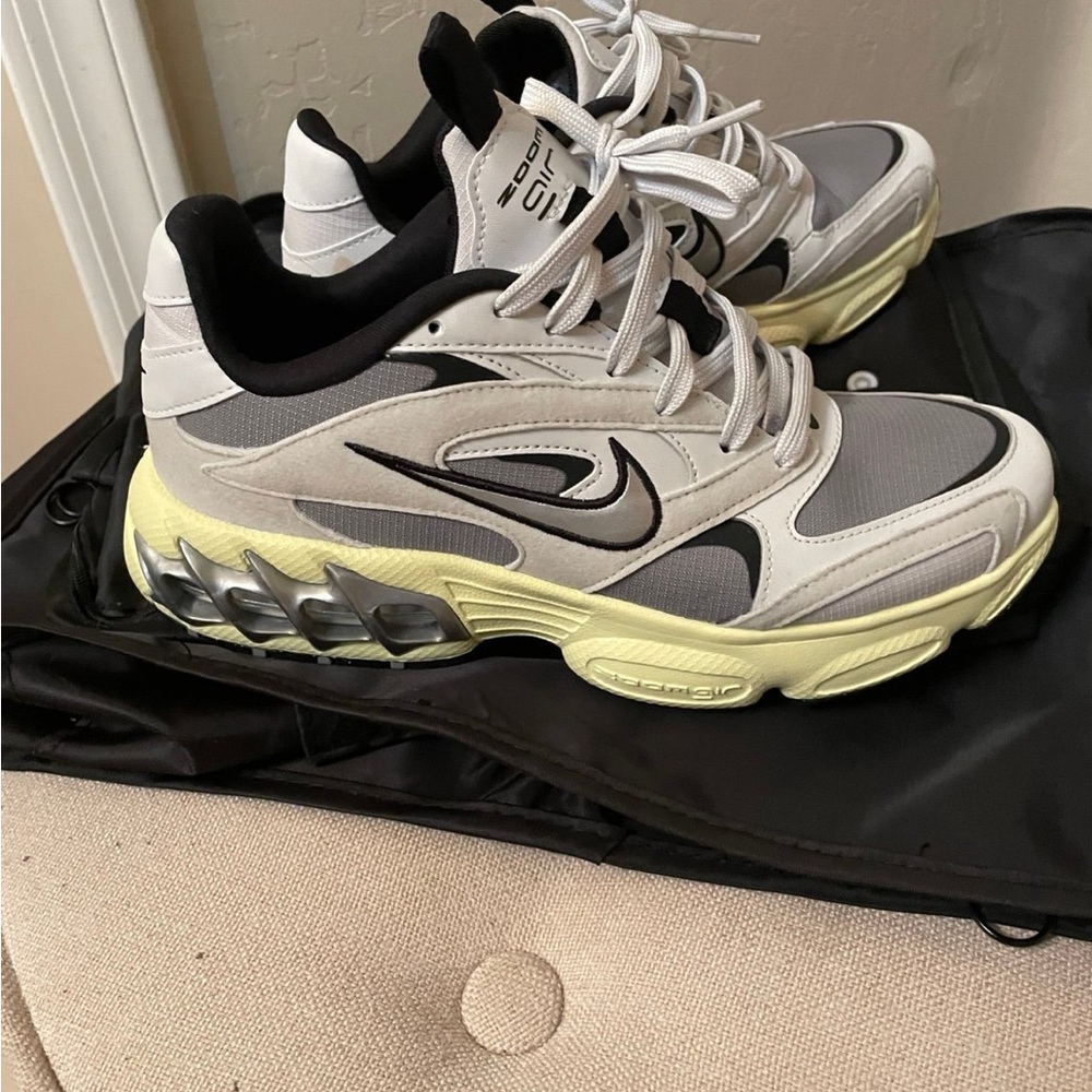 Nike Athletic Shoes in White, Black, and Yellow